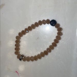 tan bracelet with a shine